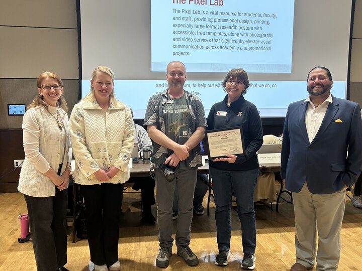 Image of Pixel Lab team receiving the Presidential Citation Award